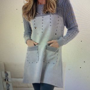 Adorable studs & color block styling add contemporary edge to this gray tunic